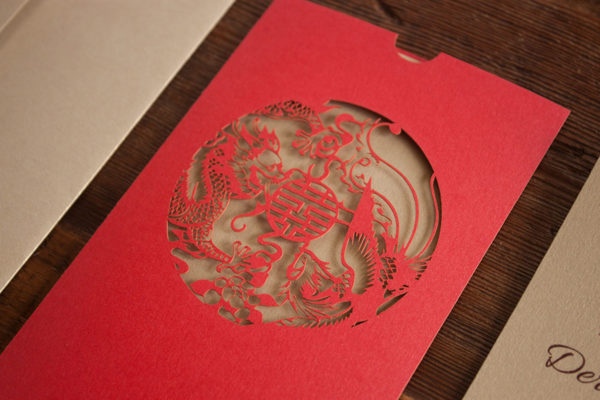 photograph of laser cut chinese wedding invitations