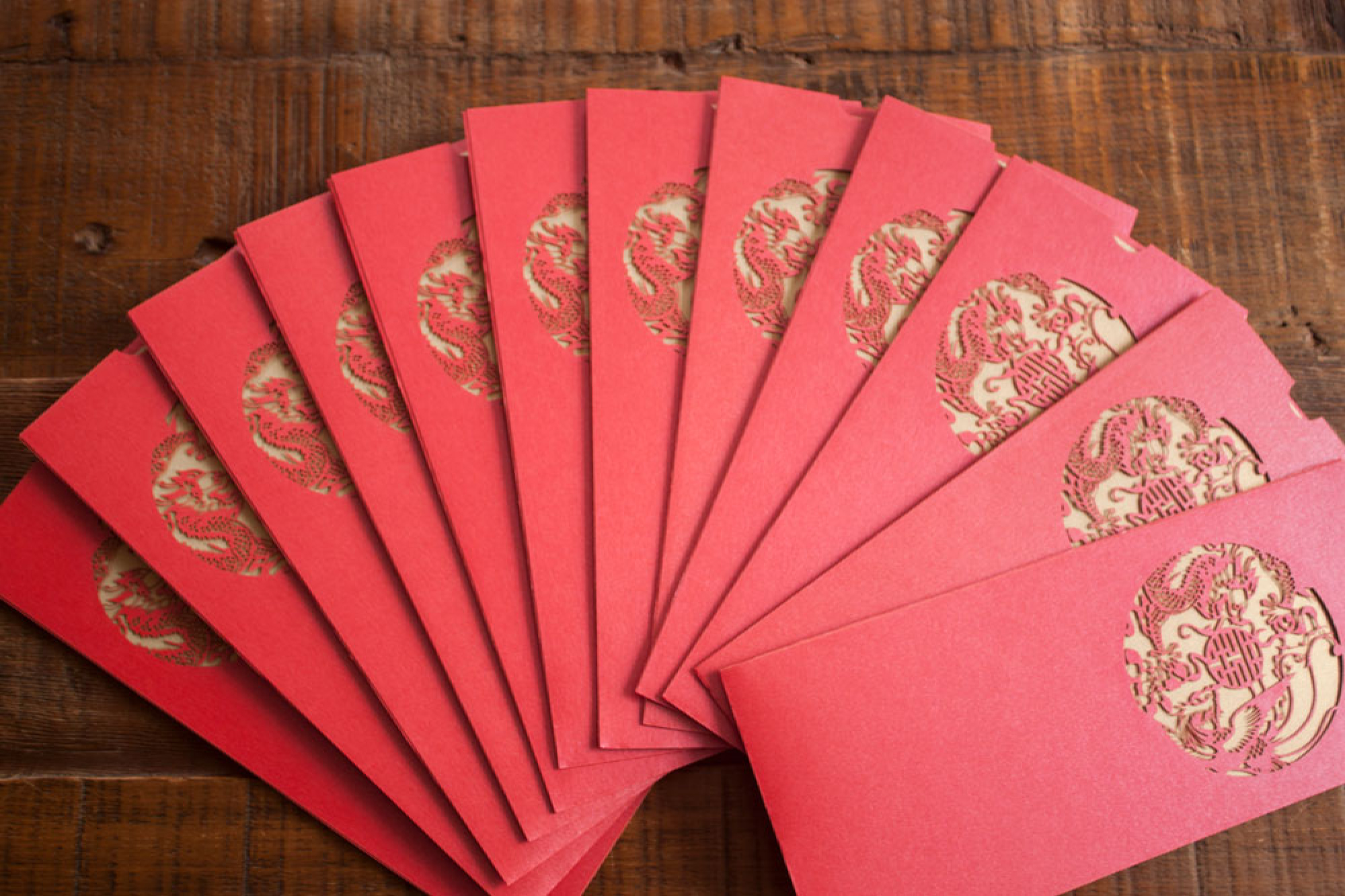photograph of laser cut chinese wedding invitations